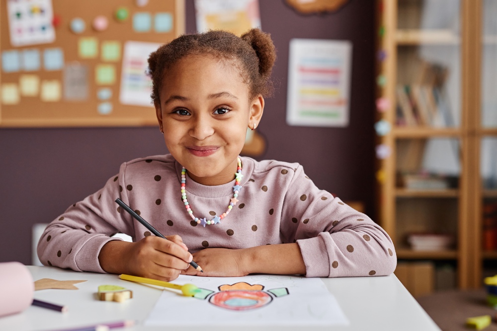 young girl at school smiling